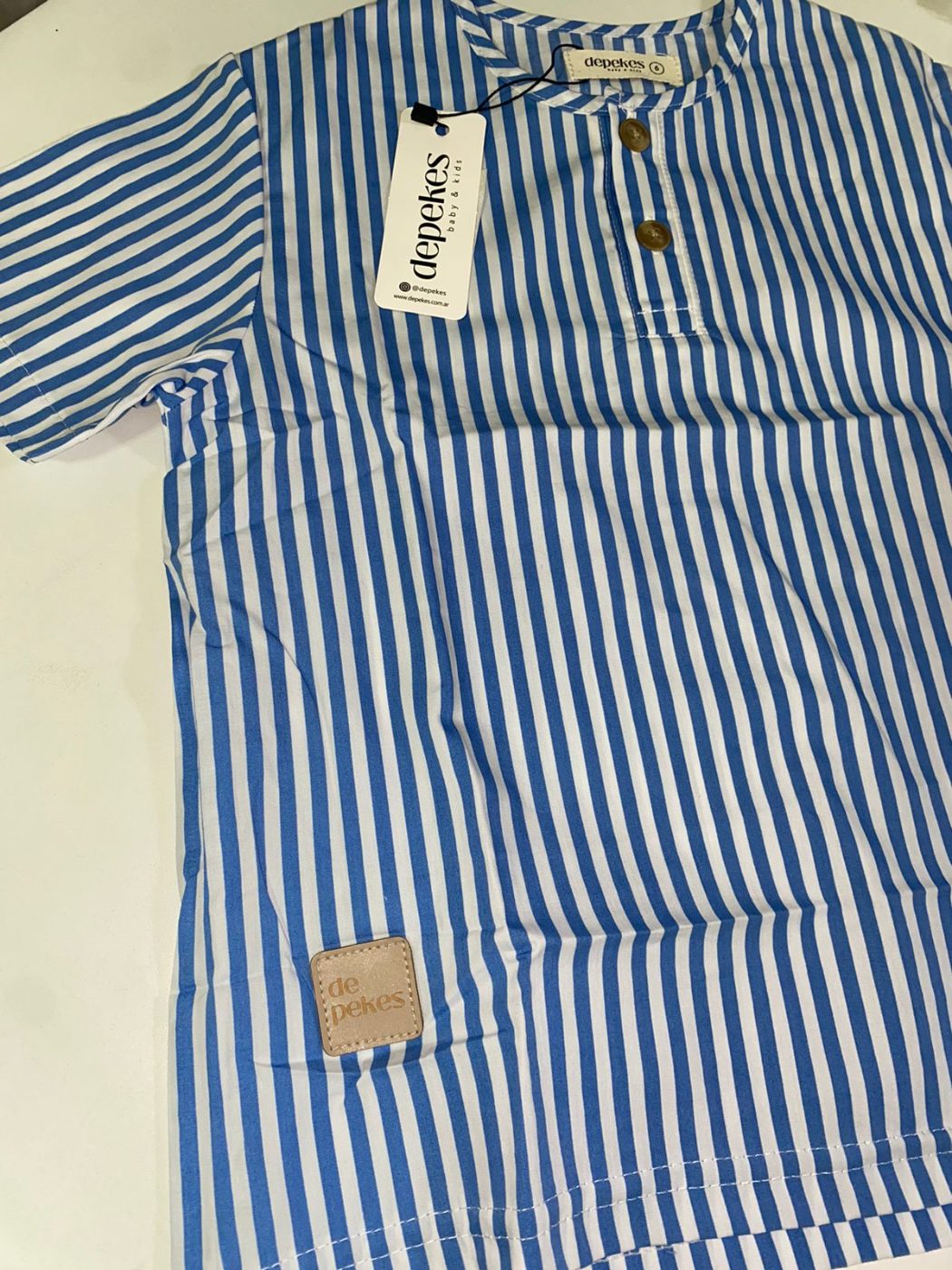 Camisa mao mangas cortas a rayas